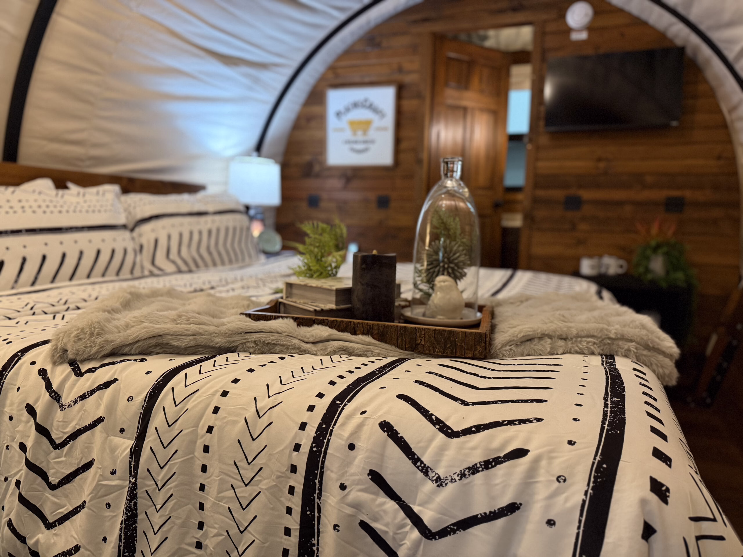 Close up of queen bed in Pioneer Elite wagon