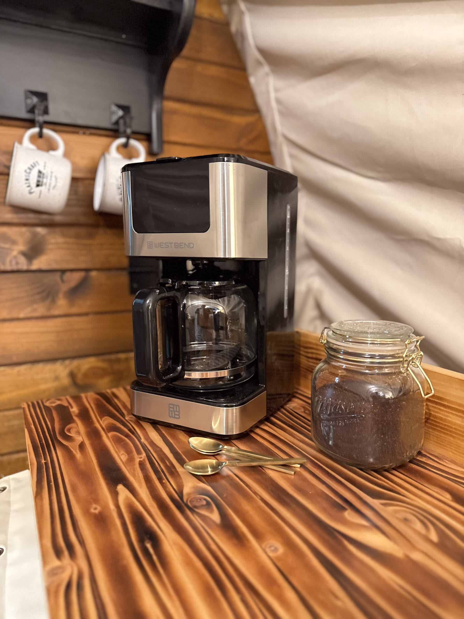 PlainsCraft long buffet table with coffee station in Pioneer Elite Wagon