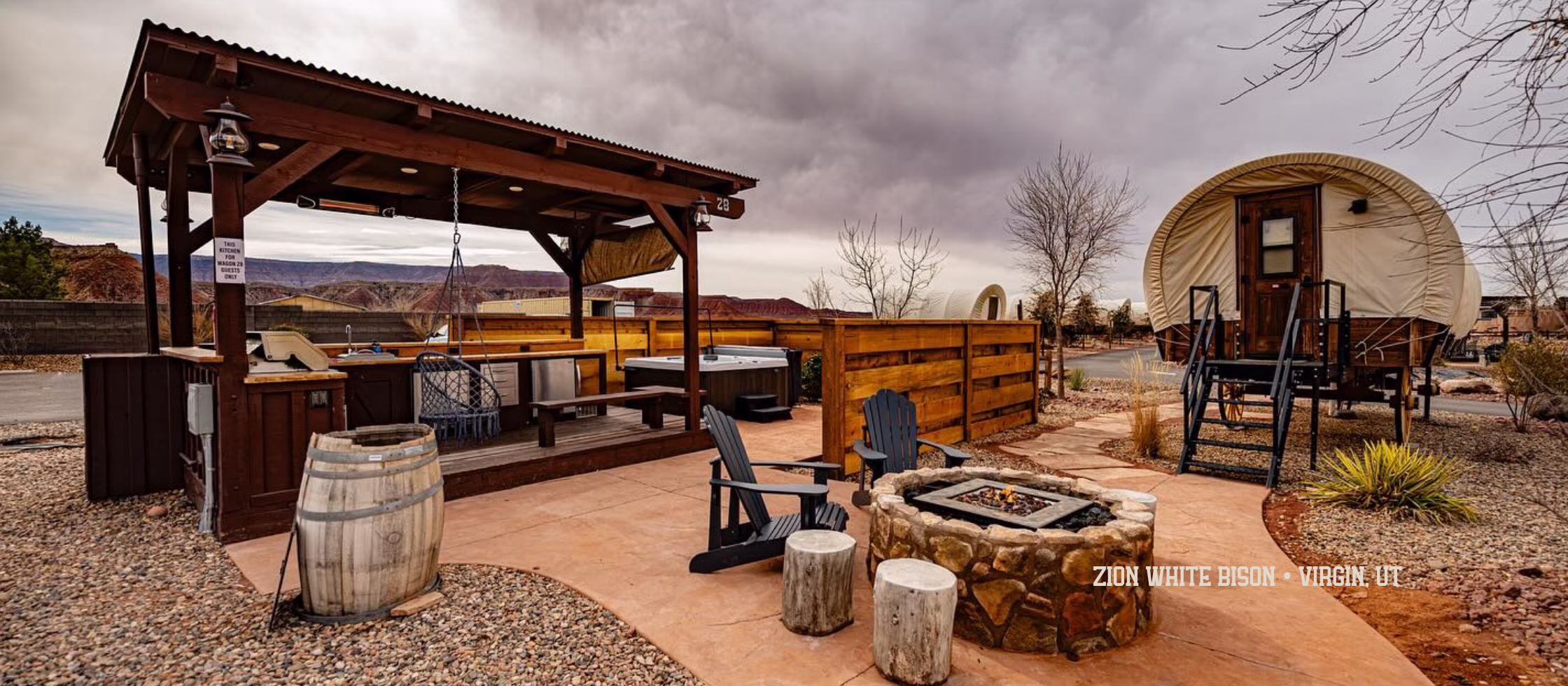 Covered wagon glamping accommodations at Zion White Bison, highlighting trends from Glamping Show Americas 2026